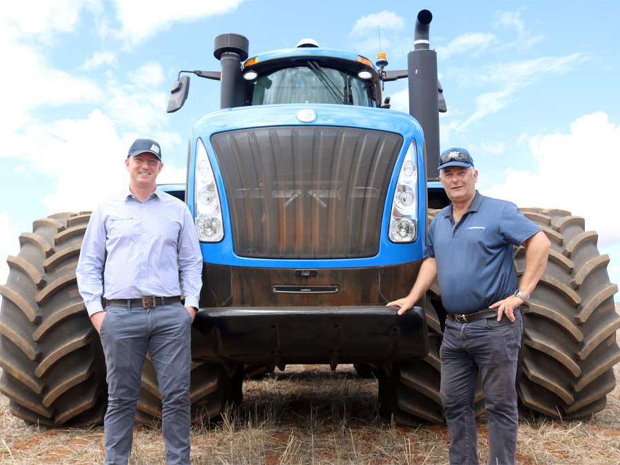 McIntosh Group CEO David Capper and McIntosh & Son Geraldton branch manager Craig Adjuk with New Hollands New T9 Tractor